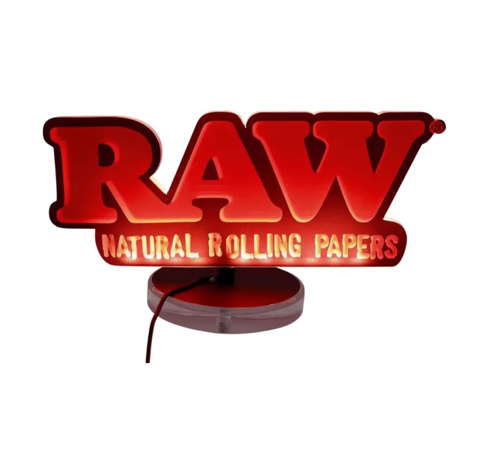 Podświetlany znak RAW z napisem "Natural Rolling Papers", montowany na podstawce i zasilany przez USB., World of RAW
